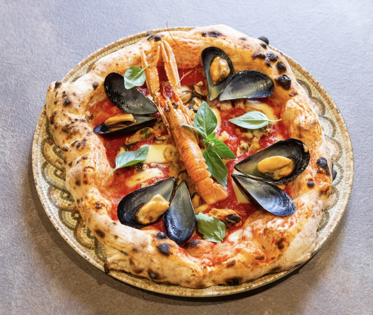 Seafood pizza with prawns and mussels