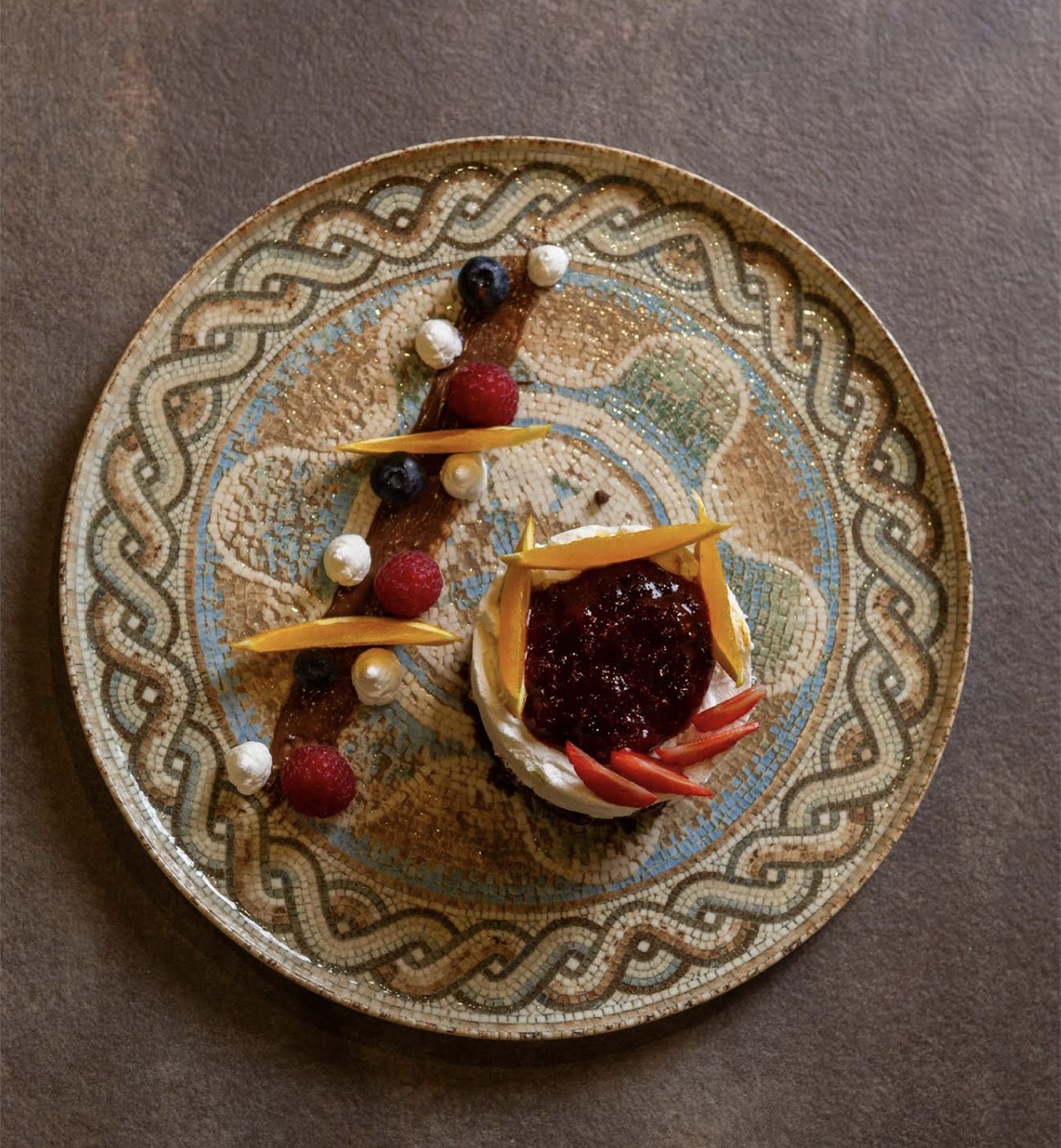 Dessert plated on a Roman mosaic dish